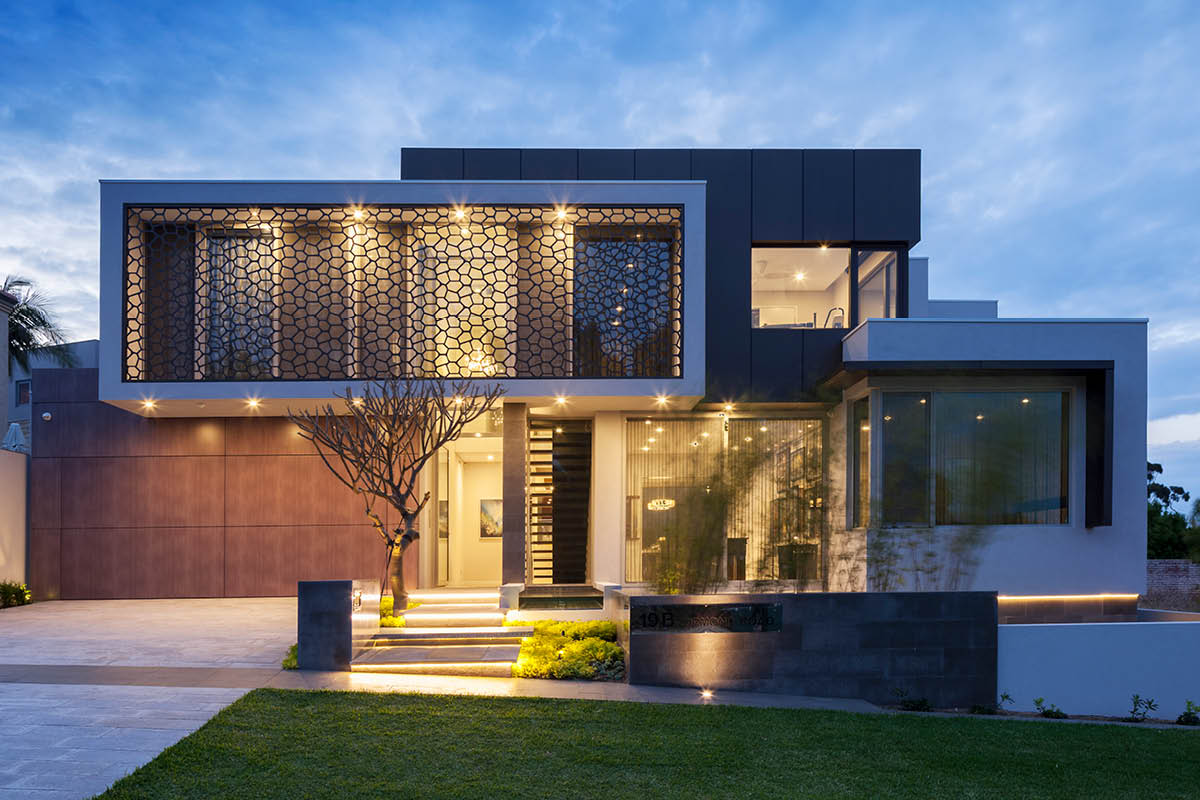 Modern architectural house front yard with lighting timber garage door and architectural feature grill on first floor